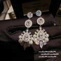 Boucles d'oreilles pendantes royales en cristal et perles avec strass marquise